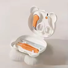 Baby_grooming_tools_including_scissors_clippers_tweezers_and_nail_file