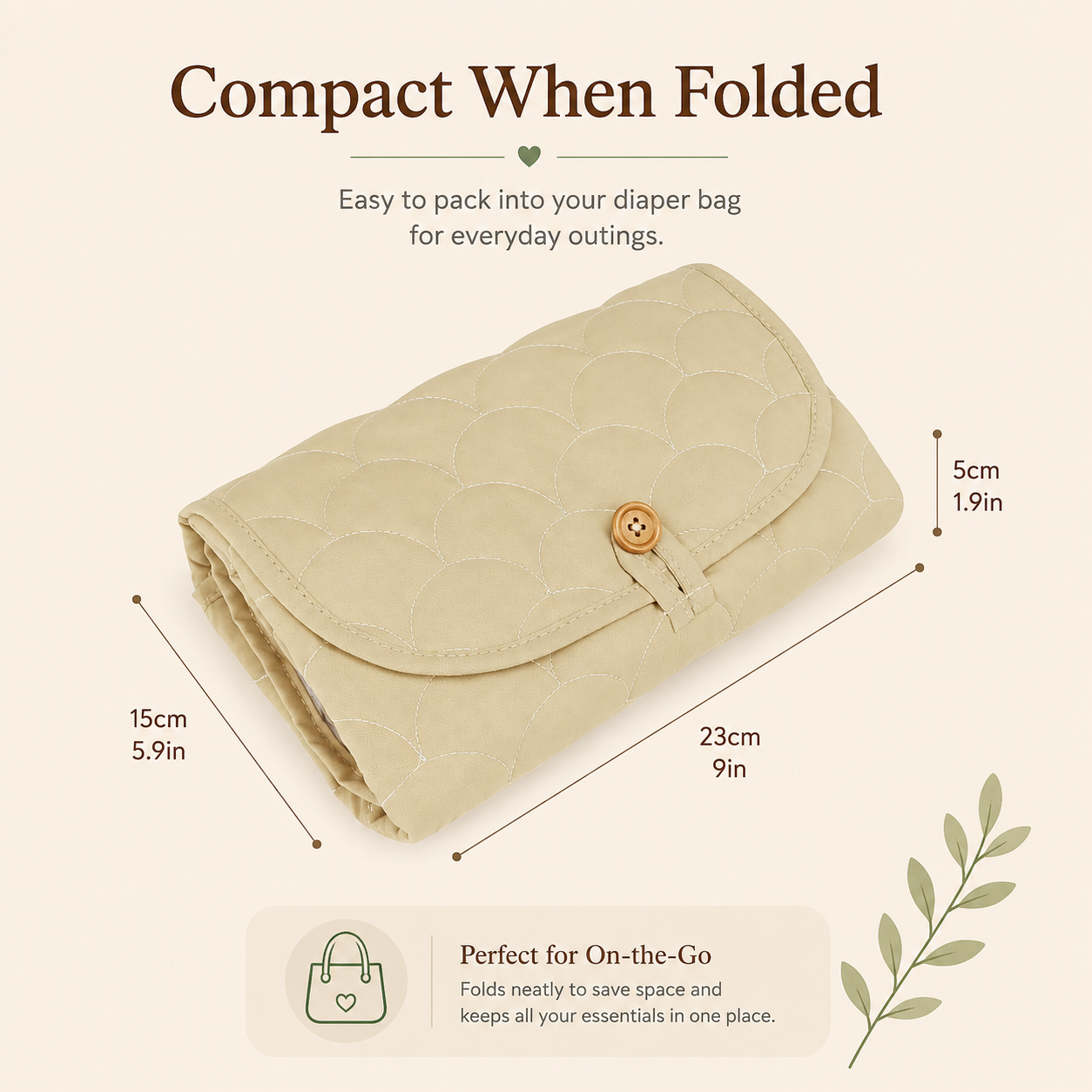 Folded portable baby changing mat showing compact dimensions of 23 cm by 15 cm by 5 cm for easy packing.