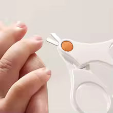 Parent_using_baby_nail_scissors_for_safe_newborn_nail_care