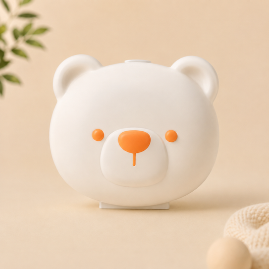Bloom & Bear baby nail trimmer kit in a compact bear-shaped travel case for safe newborn and toddler nail care.
