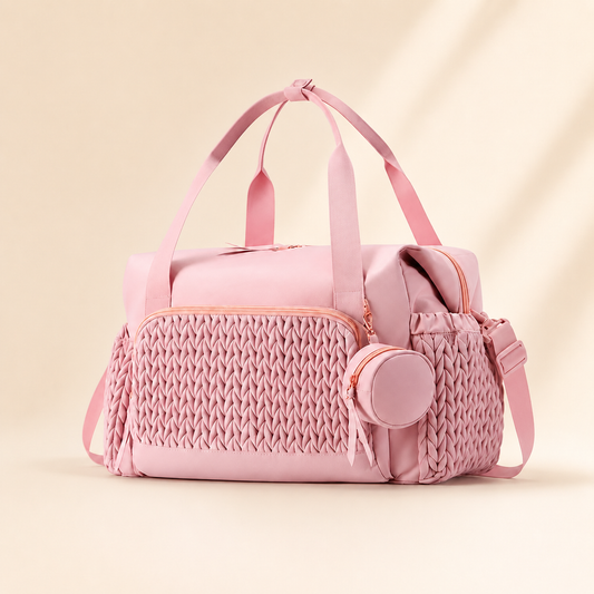 Premium quilted baby diaper bag with detachable pacifier case in blush pink